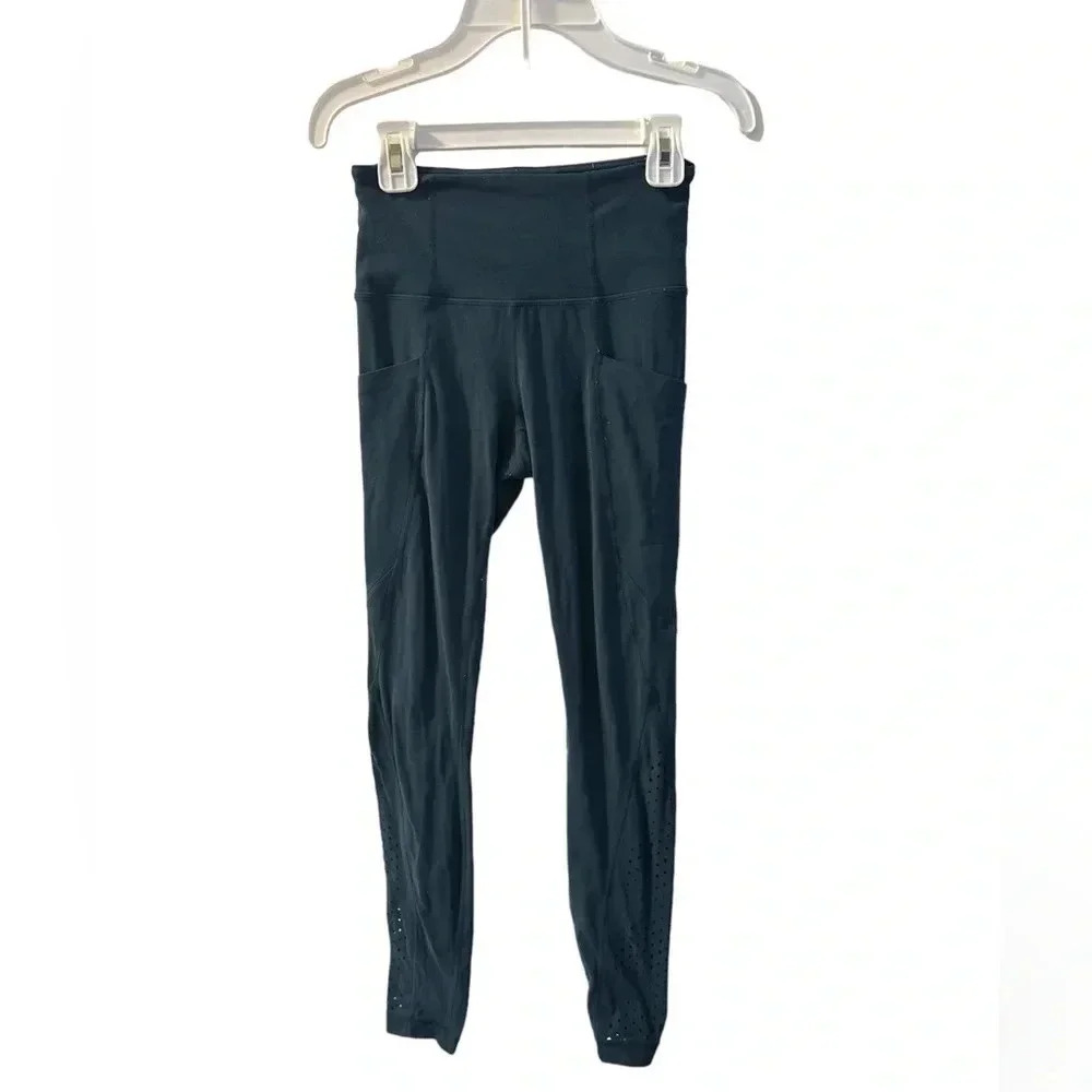 Athleta laser cut salutation leggings women’s size xxs W/ Pockets